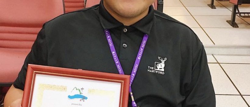 Mr. Omongos shows off his certification of Outstanding Young Chemistry Research Award